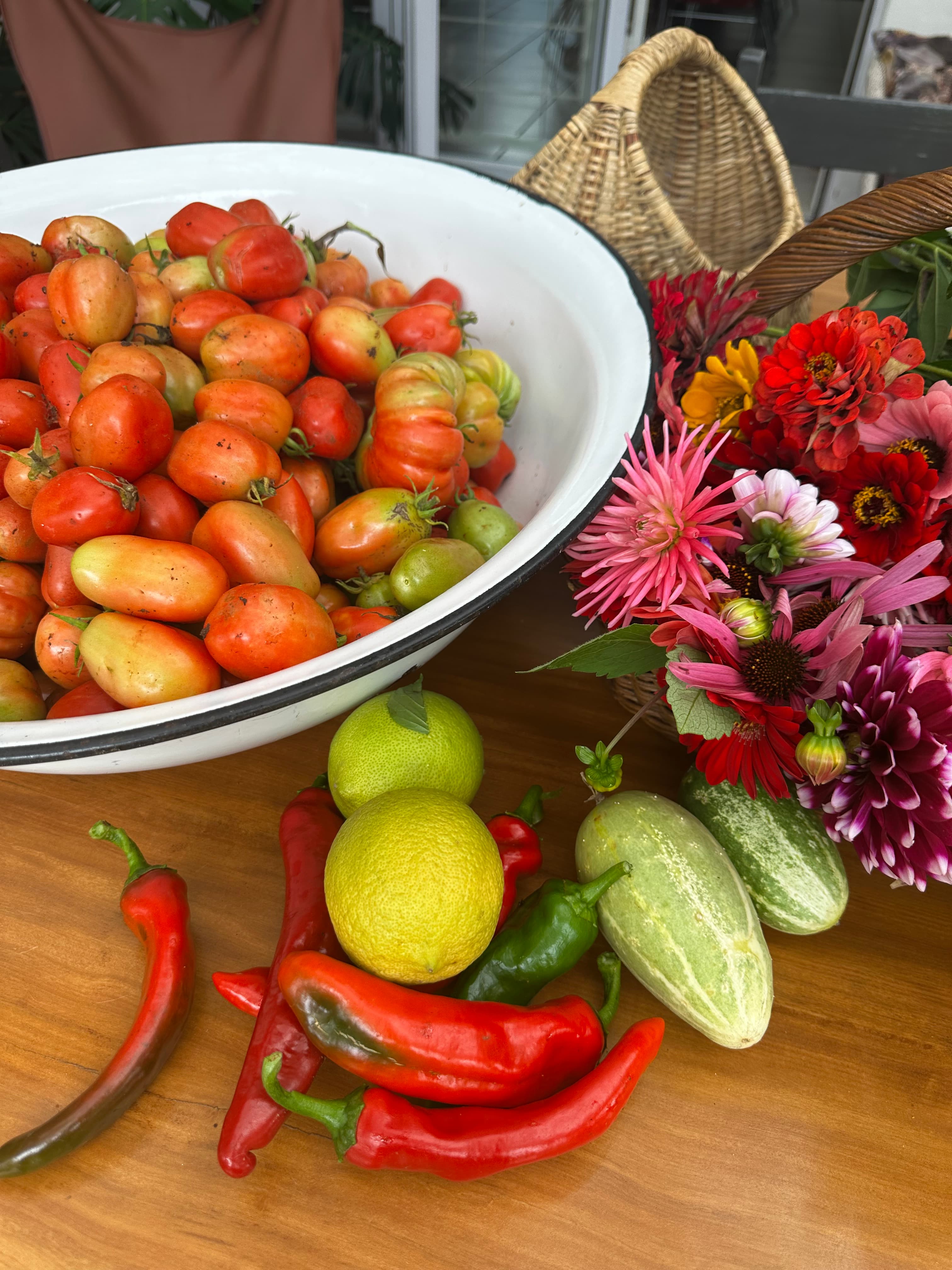 garden vegetables and flowers on wooden table